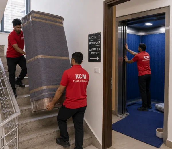 KCM crew handling a society and floor move in Sector 117 Noida