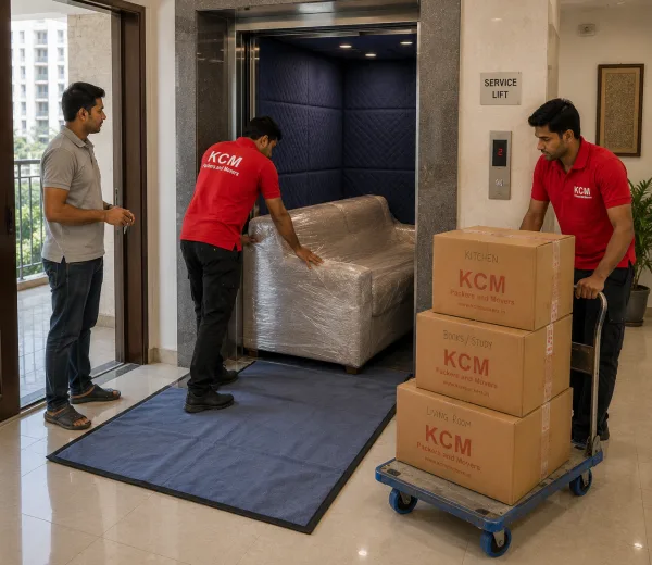 KCM crew handling a home move in Sector 121 Noida