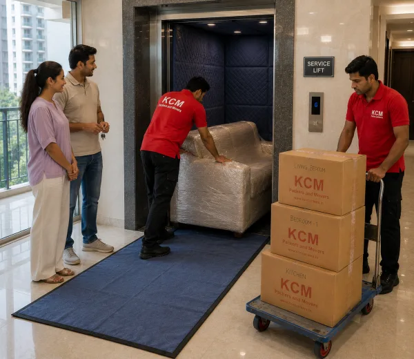 KCM crew handling a high-rise move in Sector 143 Noida